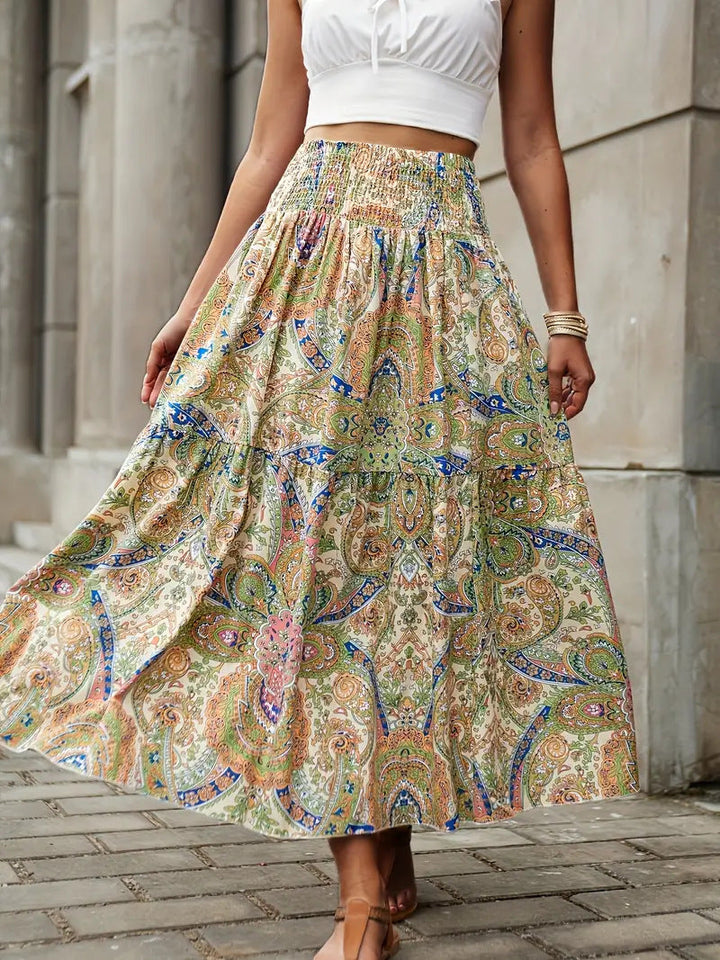 Frühlings- und Sommerrock für Damen, in A-Linie, floral bedruckt, leicht und fließend, ideal für sonnige Tage.