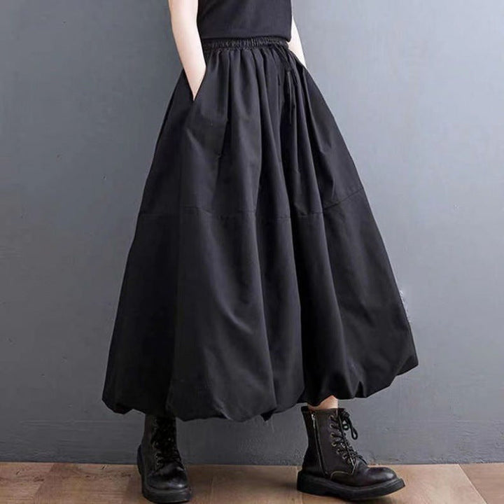 Schicker, einfarbiger Damen A-Linien Midi Rock mit hohem Bund, ideal für stilvolle Frühlings- und Herbstlooks.