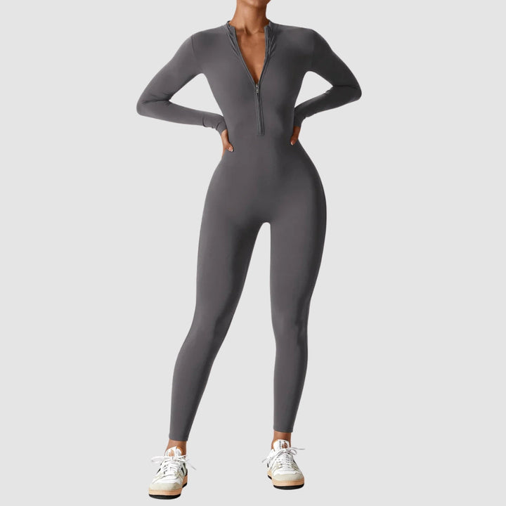 Schlanker Damen Jumpsuit mit Reißverschluss, stretchig & bequem, ideal für elegante Frühlings-Outfits.