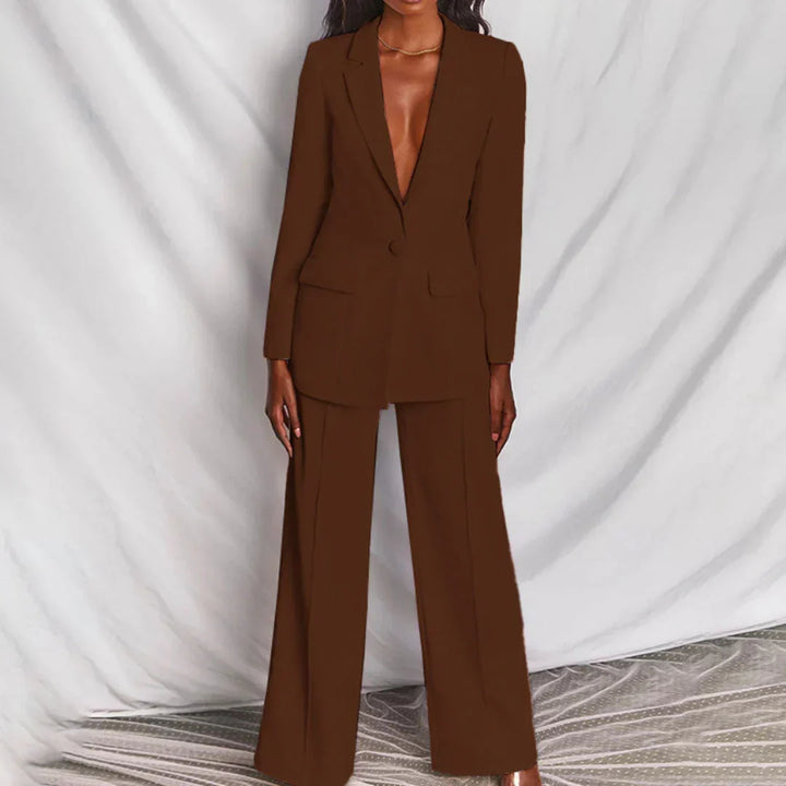 Stilvoller zweiteiliger Damen Hosenanzug: langer Blazer & weite Hose. Perfekt für festliche Events.