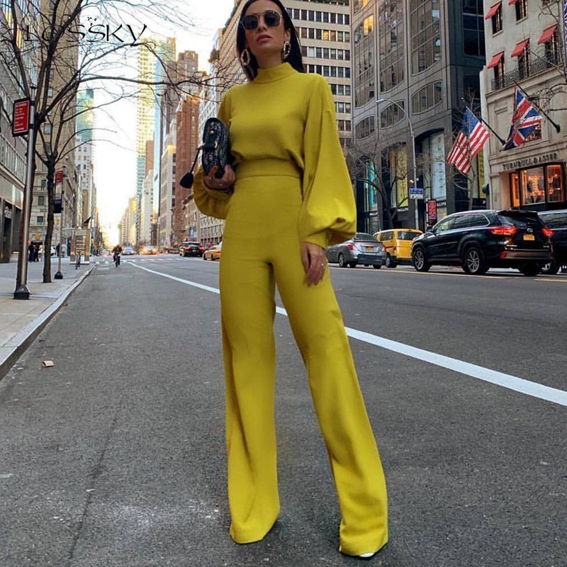 Modischer Damen Langarm Jumpsuit mit Rollkragen, weitem Bein und Seitentaschen; perfekt für Herbst- und Wintermode.