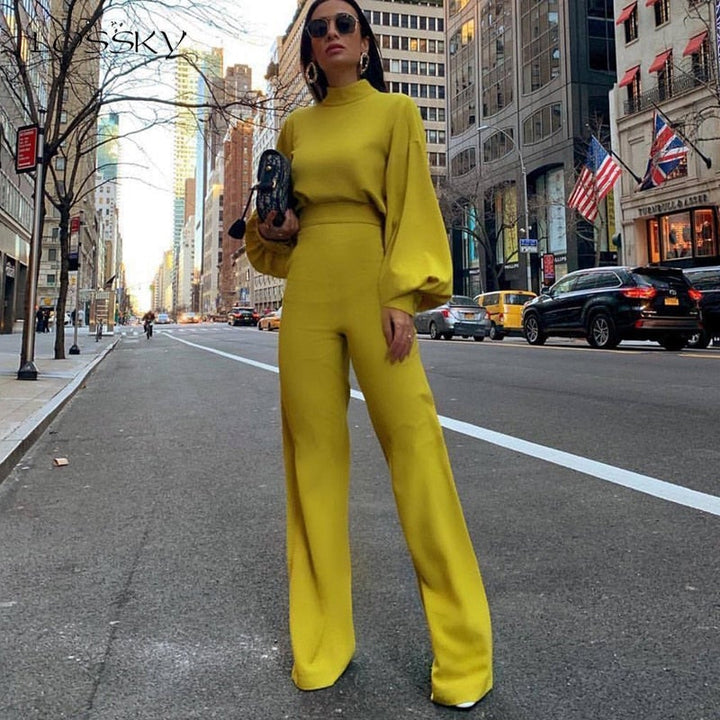 Modischer Damen Langarm Jumpsuit mit Rollkragen, weitem Bein und Seitentaschen; perfekt für Herbst- und Wintermode.