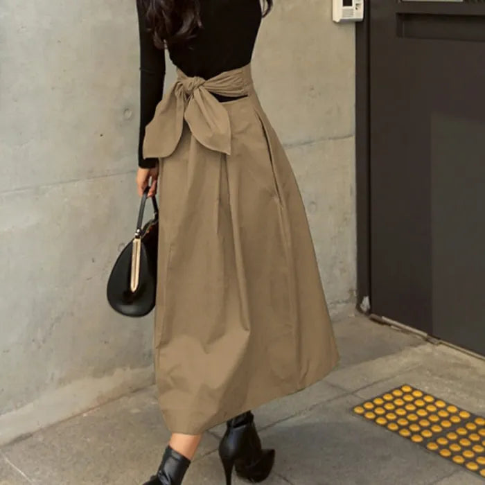 Damen Midi-Faltenrock, bequem & vielseitig. Hohe Taille für schmeichelhafte Passform. Ideal für Casual-Look oder Büro.