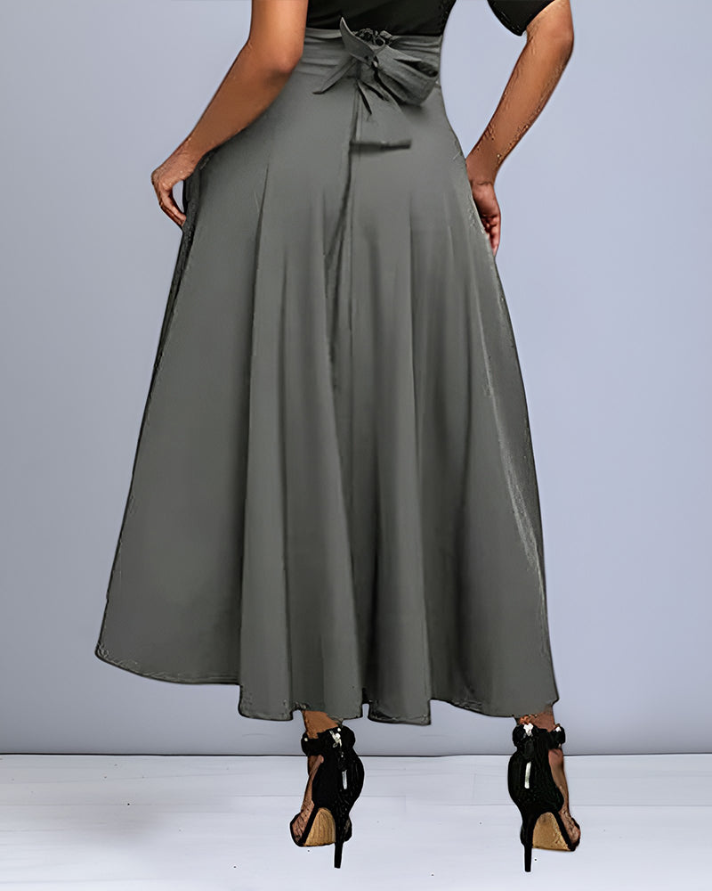 Damen Eleganter Midi Rock in Grau, stilvoll und vielseitig. Perfekter Business & Freizeitrock für alle Jahreszeiten.