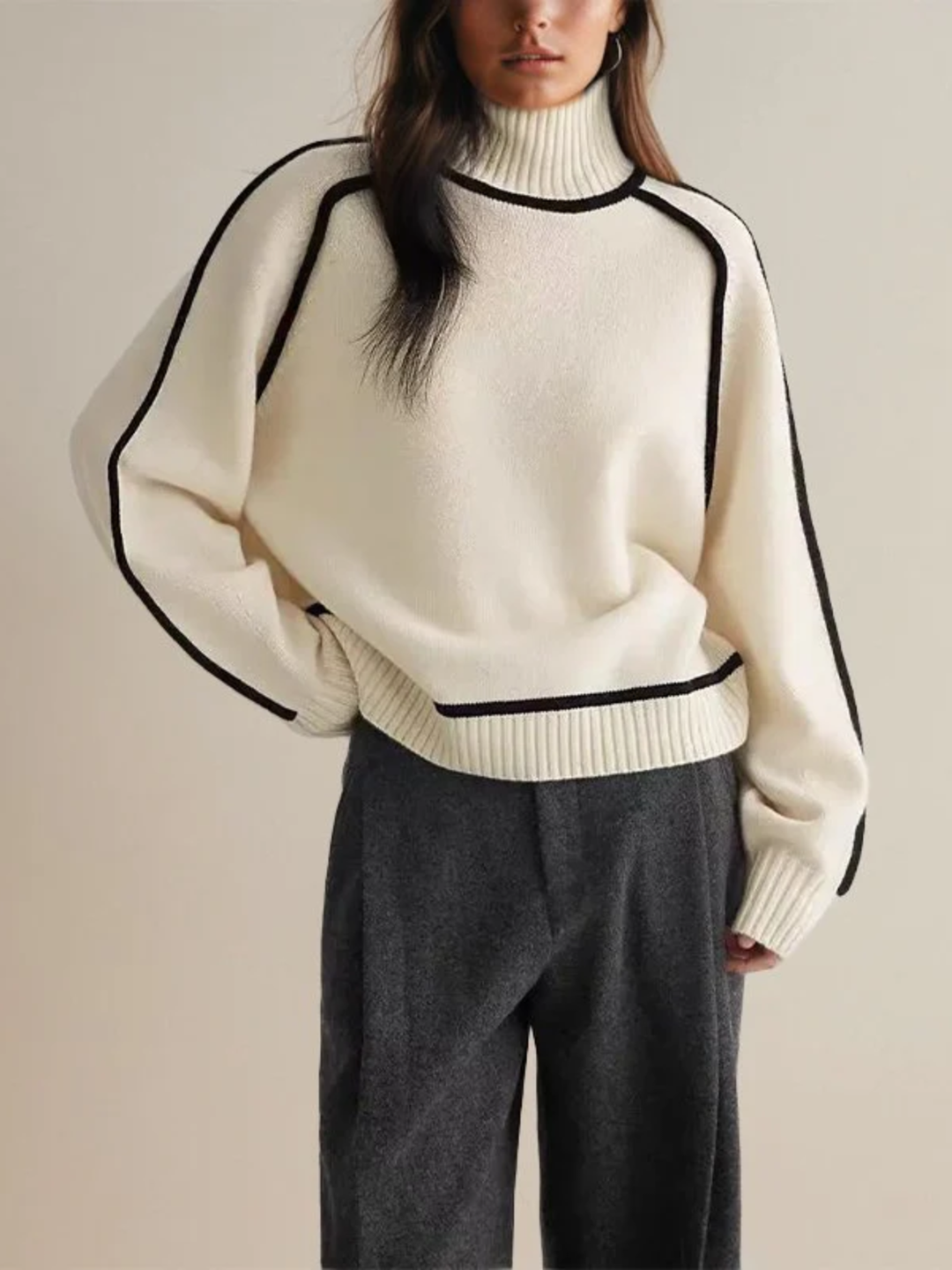Eleganter Damen Winter Rollkragenpullover im stilvollen Farbblock-Design, gemütlicher Strick.