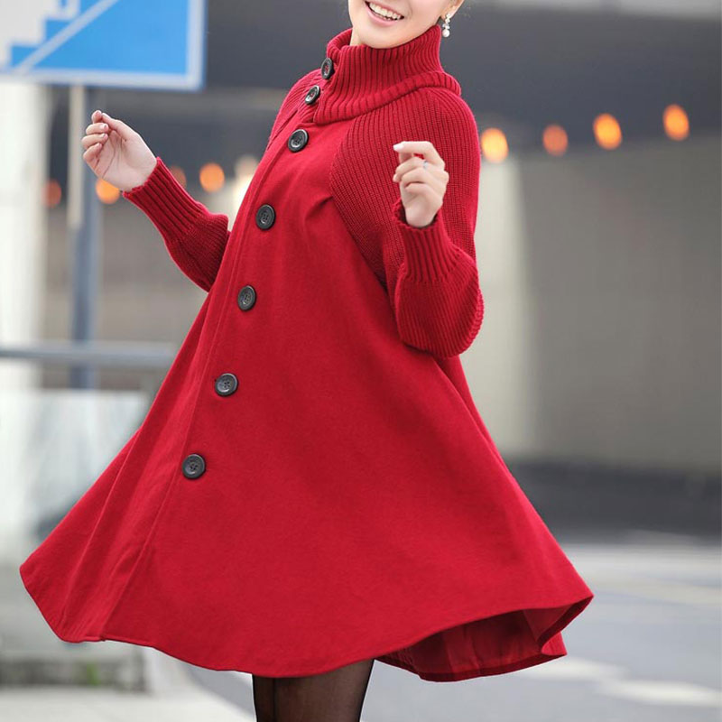 Bequemer und eleganter Damenmantel in Grau mit hohem Kragen und Gürtel, ideal für modische Winteroutfits.