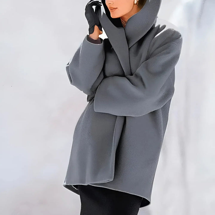 Stilvoller Damen Wintermantel, eleganter Schnitt und einfarbig, perfekt als warme Jacke für Damen.