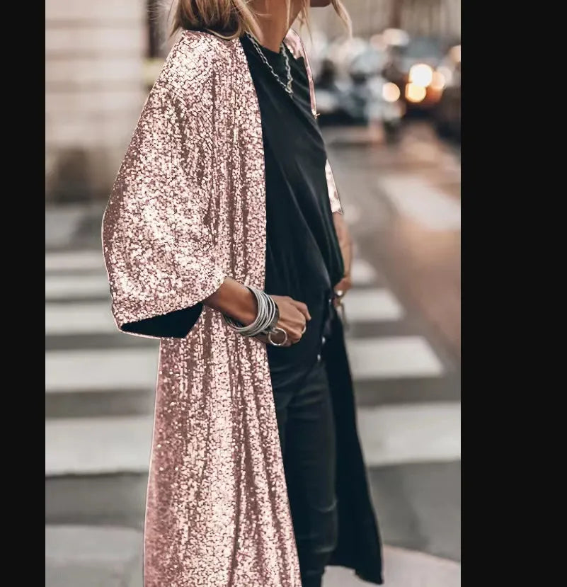 Damen-Abendmantel, lang & elegant, mit Taillengürtel und praktischen Seitentaschen. Perfekt für kühle Abende.