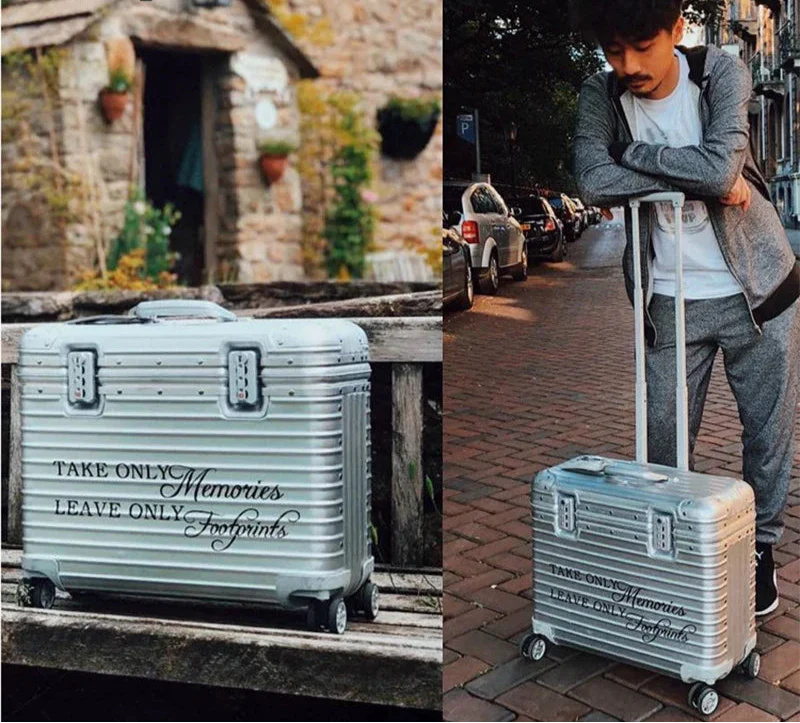 Offener Monaco Reisekoffer aus Aluminium-Magnesium, mit geräumigen Fächern und Gurten für organisiertes Packen.