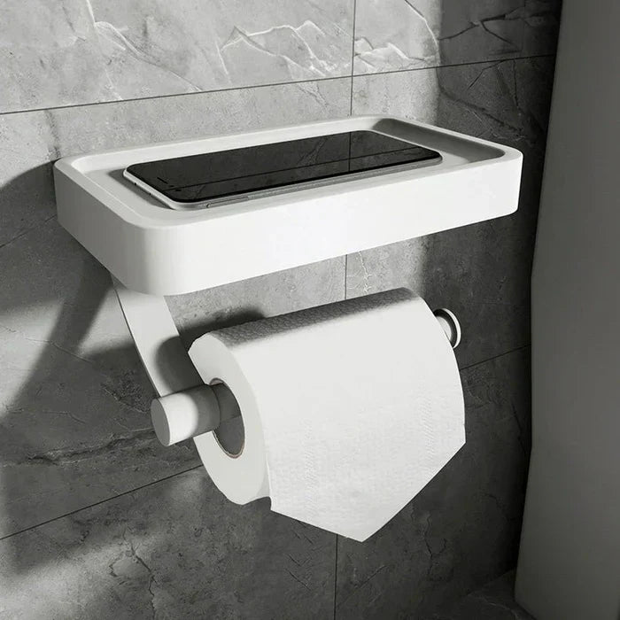Eleganter Toilettenpapierhalter mit Ablage aus gebürstetem Edelstahl in Weiß, vielseitig für verschiedene Badstile.