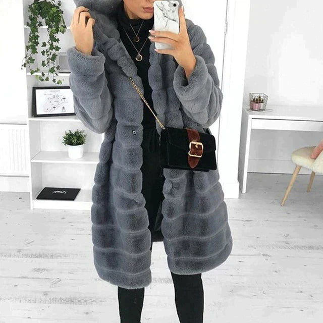 Eleganter, wasserdichter Damen Wintermantel, knielang und warm, ideal für kaltes Wetter und Outdoor-Aktivitäten.