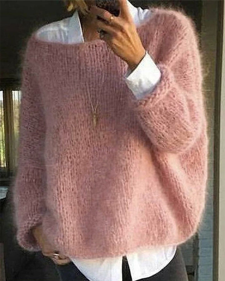 Eleganter, zeitloser Damen Strickpullover in Rosa, warm und gemütlich für den Winter.