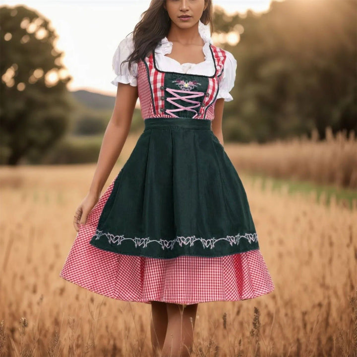 Elegantes bayerisches Damen Dirndlkleid für den Herbst mit traditioneller Schürze, ideal für Oktoberfest & Volksfest.