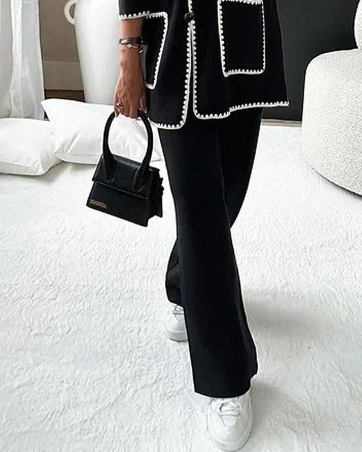 Vielseitiges Damen Set: eleganter Cardigan und weite Hose, ideal für Business-Looks und schicke Büromode.
