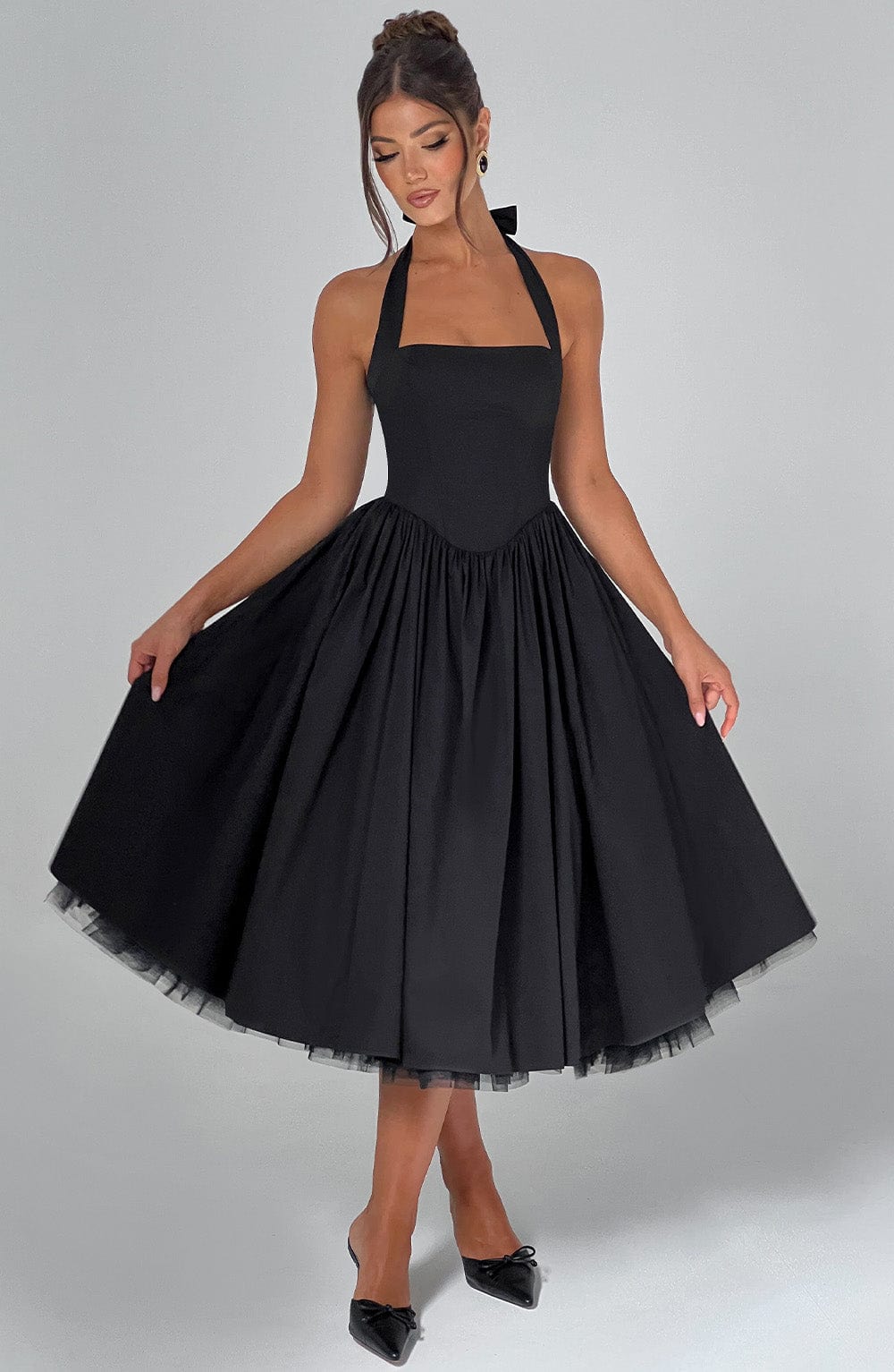 Elegantes Partykleid für Frauen, Halter Midi Stil, ideal für feierliche Events.