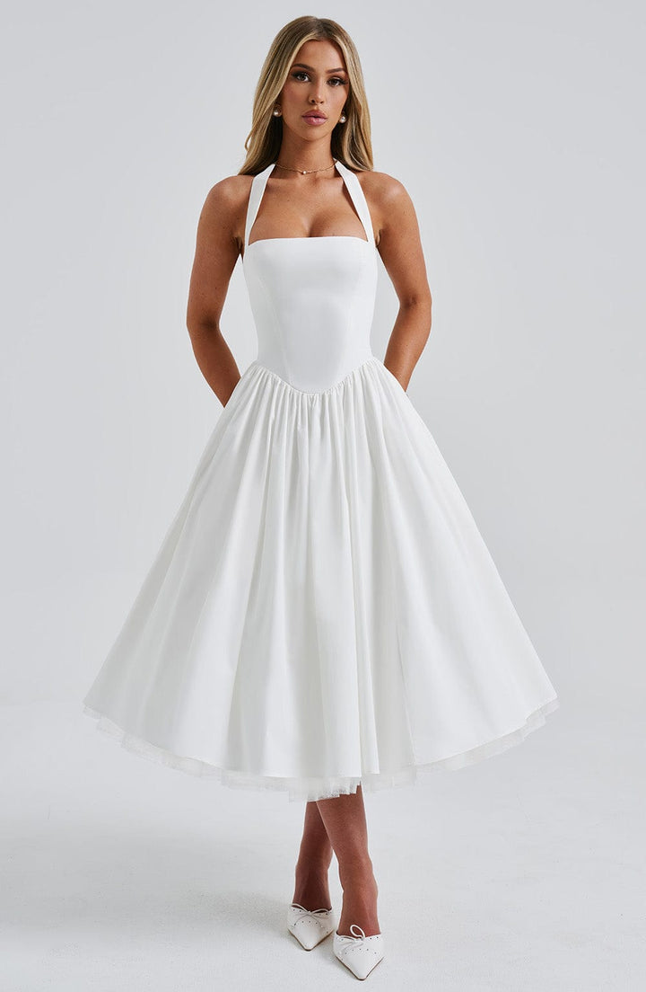 Damen Halterkleid in Midilänge, schick und modisch für festliche Veranstaltungen.