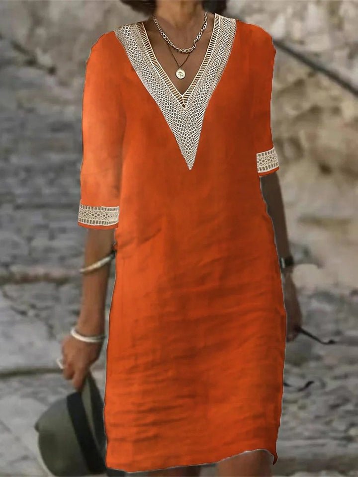 Elegantes Damen Herbstkleid mit V-Ausschnitt und Spitzenbesatz, bequemer Passform und 3/4-Ärmeln.