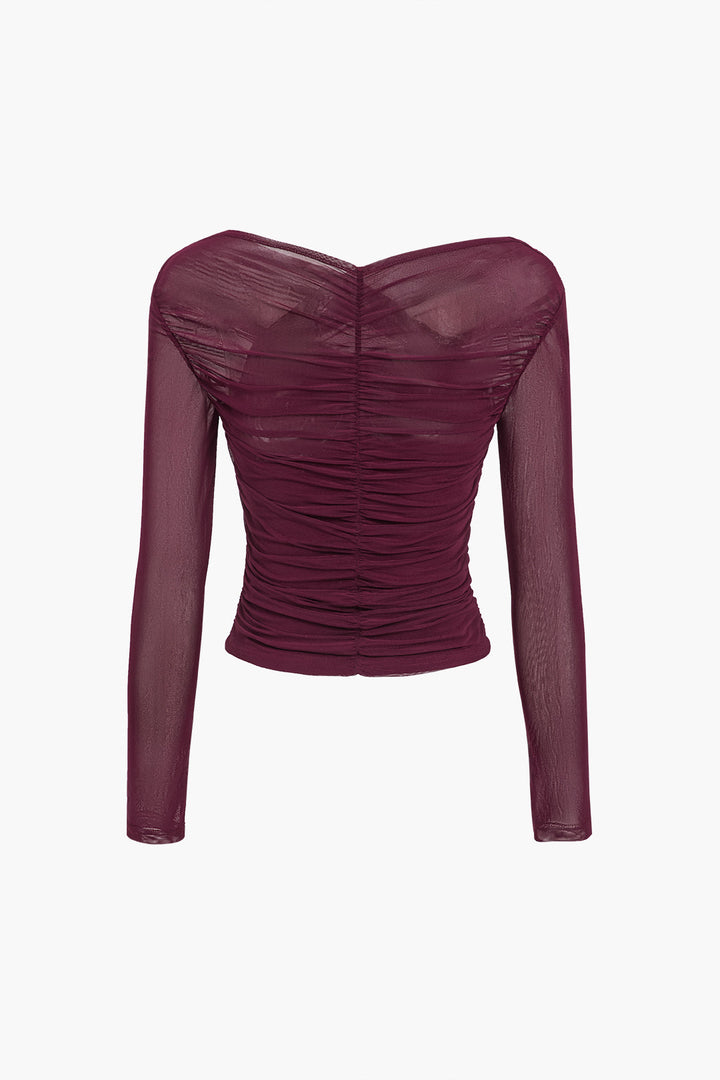 Feminines Damen Langarmtop in Schwarz mit stilvollen Rüschen, perfekt für Abend- und Freizeitlooks.