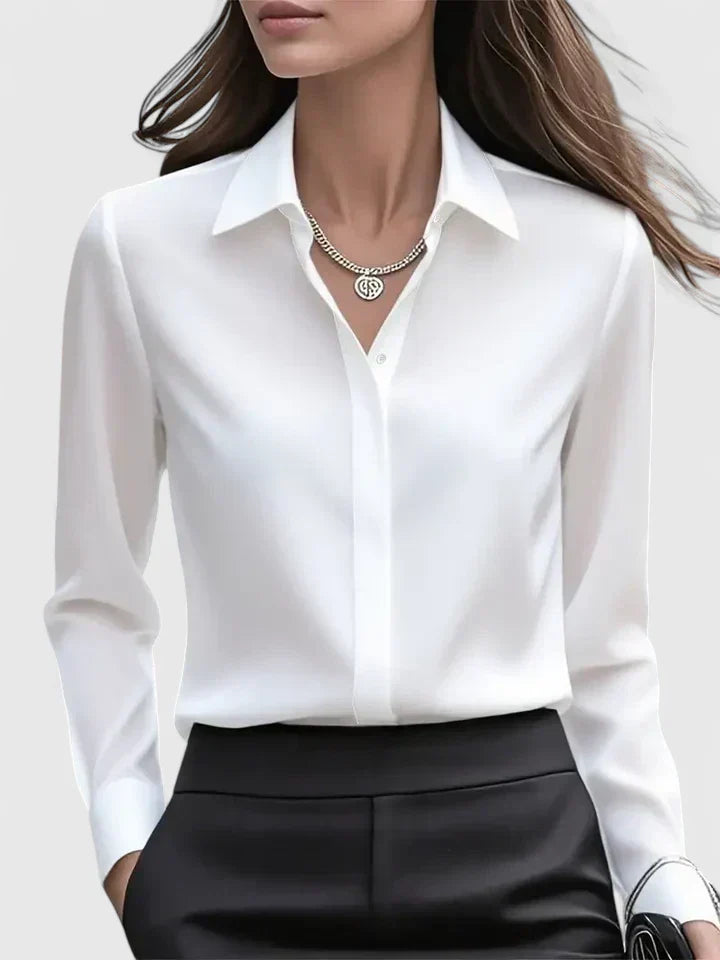 Klassisch-elegantes Damen Langarmshirt, minimalistisch und zeitlos, perfekt für jede Garderobe.