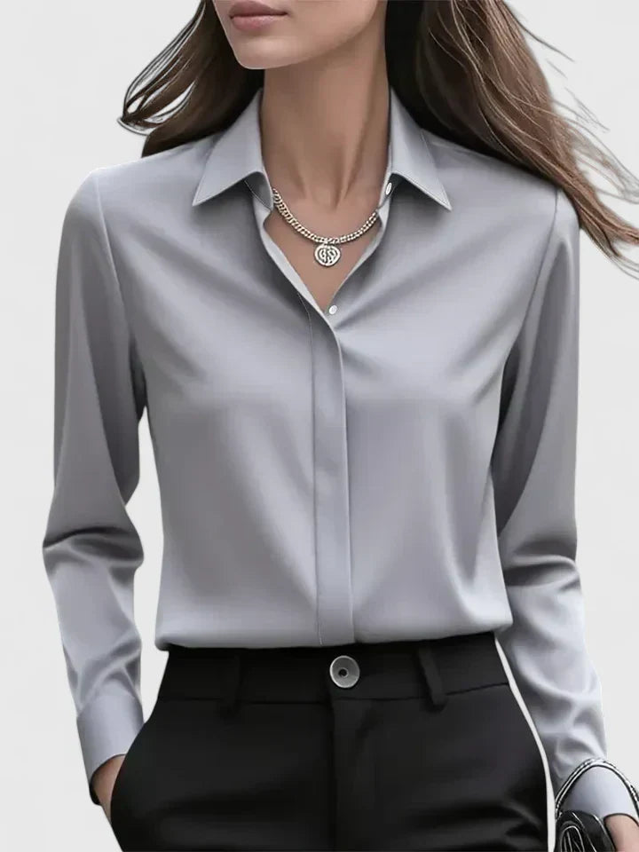 Stilvolles Damen Langarmtop in Grau, ideal für elegante und lässige Kombinationen.