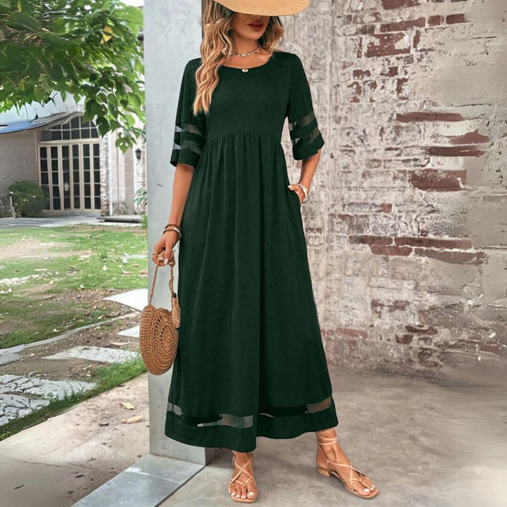 Stilvolles Damenkleid, Maxikleid-Schnitt. Elegantes Partykleid mit V-Ausschnitt für Abendveranstaltungen.