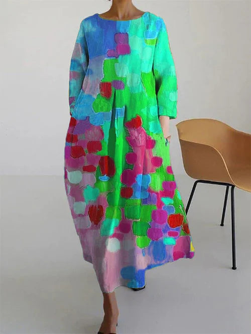 Fließendes Damen Maxikleid mit abstraktem Blumenmuster. Ideales Sommer-Urlaubskleid oder Strandkleid im Boho Stil.