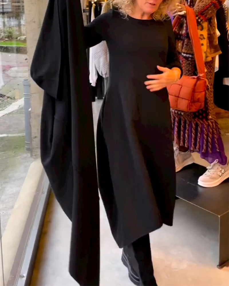 Rückenansicht des vielseitigen Damen Midikleids mit A-Linie und langen Ärmeln, ideal für Herbst & Winter.