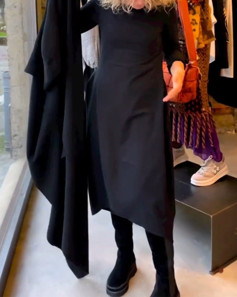 Stofftextur des bequemen Damen Midikleids, langärmlig, A-Linie, mit Taschen. Ideal als Herbst-Winter-Kleid.