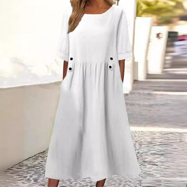 Bequemes Damen Herbst Midikleid mit Rundhals-Ausschnitt. Atmungsaktives Freizeitkleid, locker geschnitten.