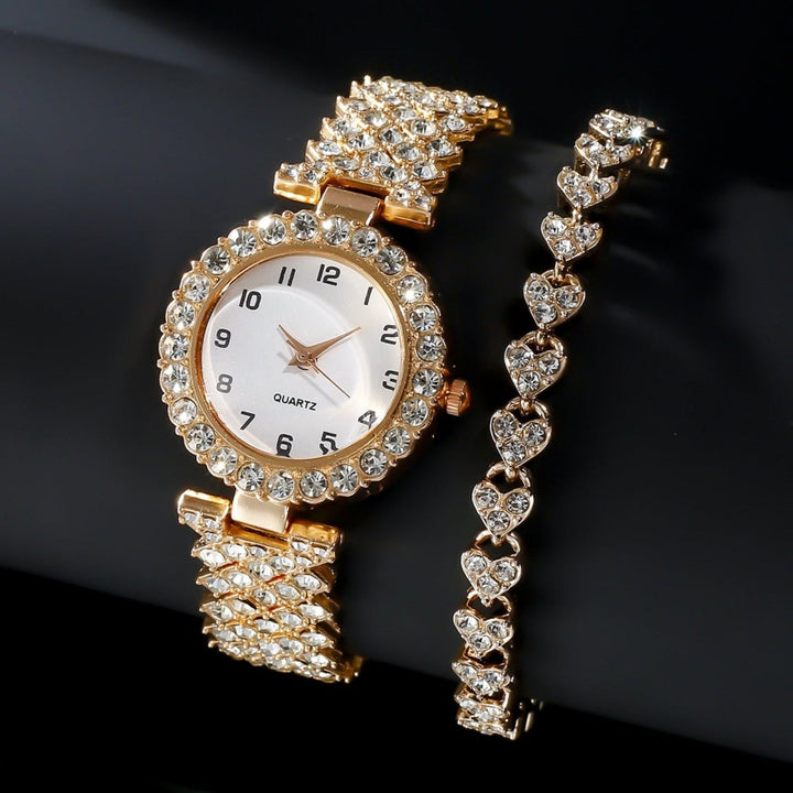 Damen Schmuckset: Uhr mit Glitzersteinen und Herzarmband, luxuriös und elegant, ideal für besondere Momente.