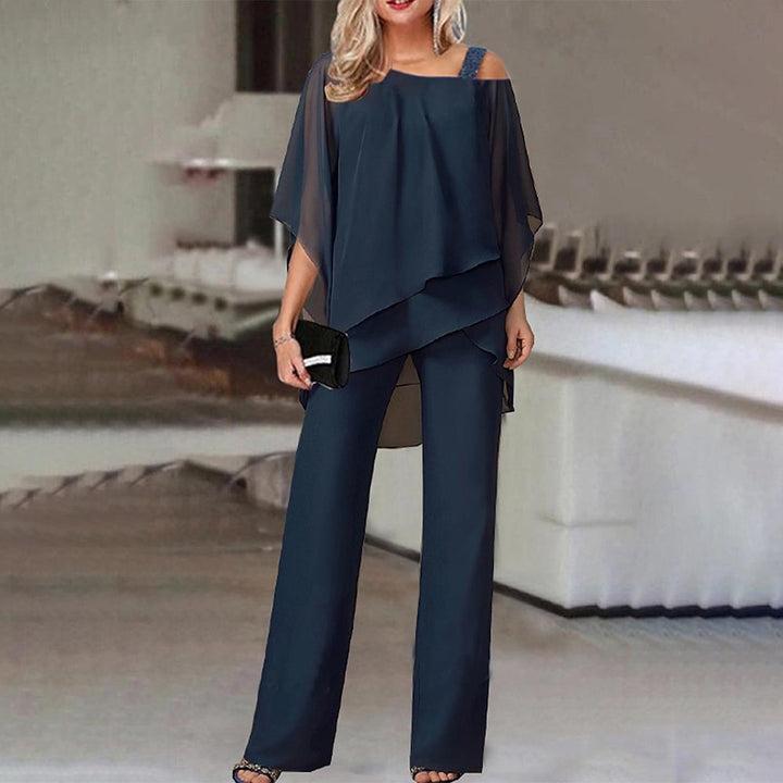 Hochwertiges Damenbekleidungs Zweiteiler-Set mit schulterfreiem Top & passender Hose. Ideal für Herbst-Eleganz.