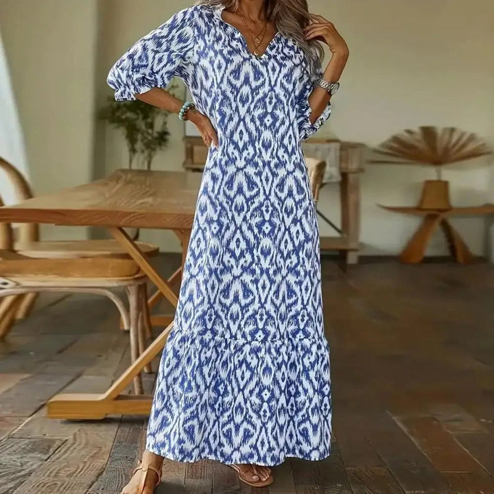 Langes blaues Damen Sommerkleid, modisch & bequem. Fließendes Maxikleid ideal für Freizeit, Strand & Urlaubstage.