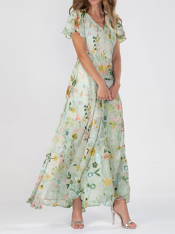 Elegantes grünes Damen Maxikleid mit Blumenmuster und V-Ausschnitt, perfekt als Sommer- oder Strandkleid.
