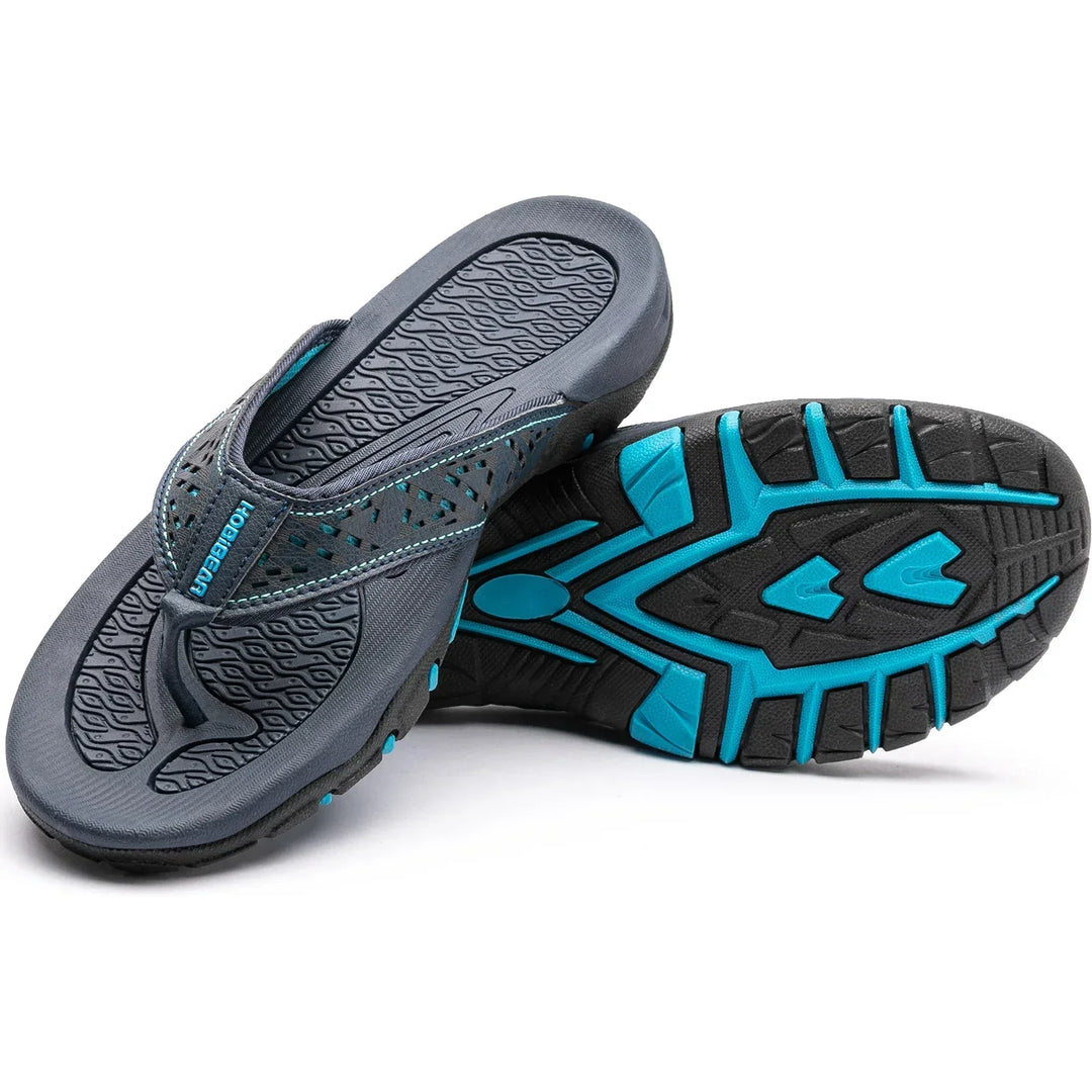 Ergonomische Herren Slipper in Weiß/Schwarz, bequem und stützend, ideal für ganztägigen Komfort.