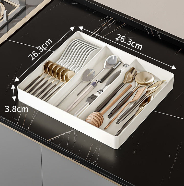 "Flexibler Schubladen Organizer, modernes Design, ideale Küchenorganisation, robust, vielseitig für Besteck und Utensilien."