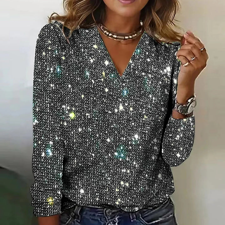 Glitzerndes Damen-Partyshirt mit V-Ausschnitt, langärmlig. Elegant & glamourös für festliche Anlässe.