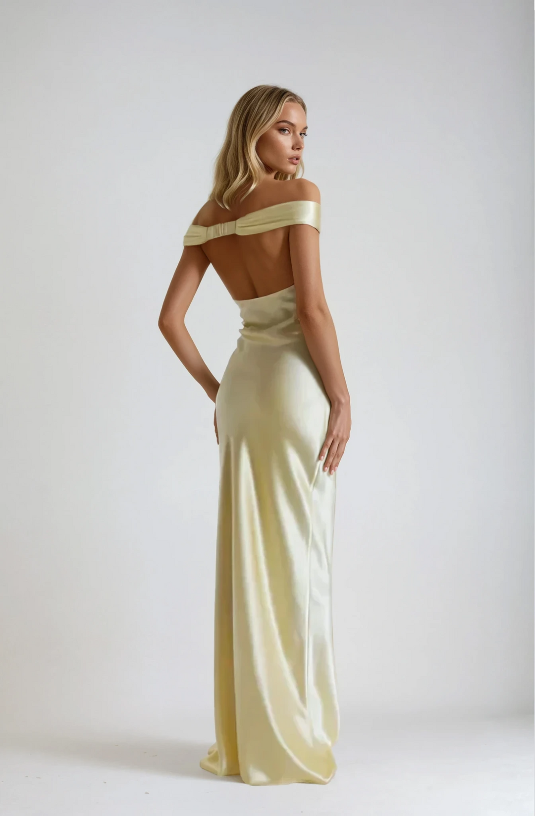 Gelbes Damen Abendkleid, bodenlang mit raffiniertem Rückenausschnitt, elegantes Design für Festlichkeiten.