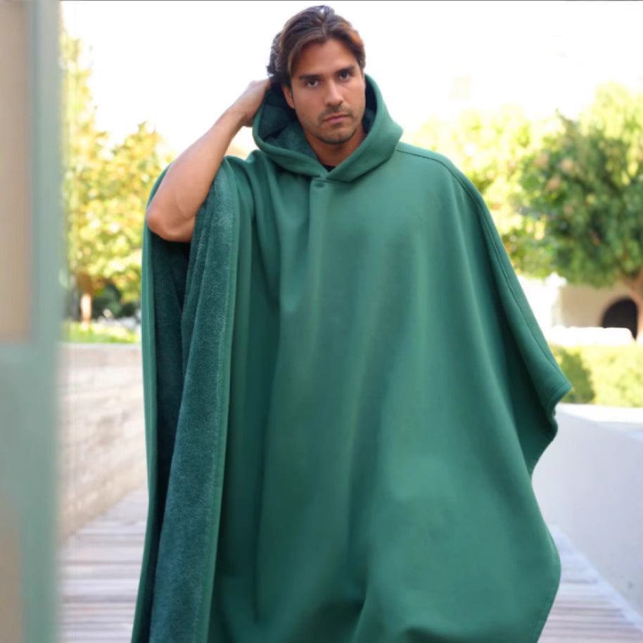Praktische Kapuzendecke mit Ärmeln und Tasche, ideal für Wärme und Entspannung; stilvolle Loungewear.