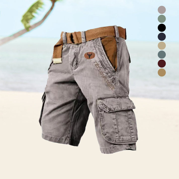 Graue Cargo-Shorts für Herren, seitliche Ansicht, langlebiges Baumwollmaterial, sechs Taschen, ideal für Sommeraktivitäten.