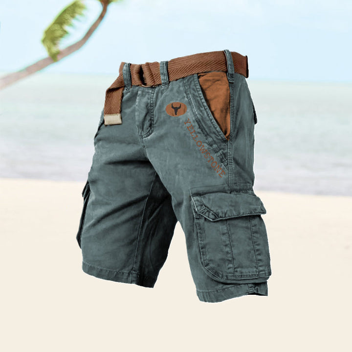 Graue Cargo-Shorts für Herren, seitliche Ansicht, langlebiges Baumwollmaterial, sechs Taschen, ideal für Sommeraktivitäten.