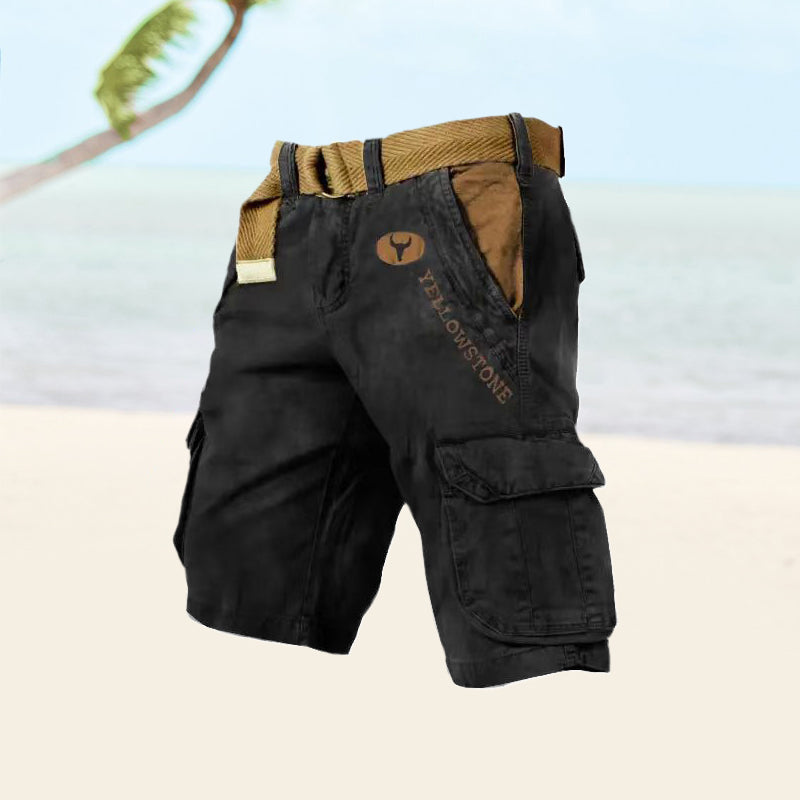 Graue Cargo-Shorts für Herren, seitliche Ansicht, langlebiges Baumwollmaterial, sechs Taschen, ideal für Sommeraktivitäten.