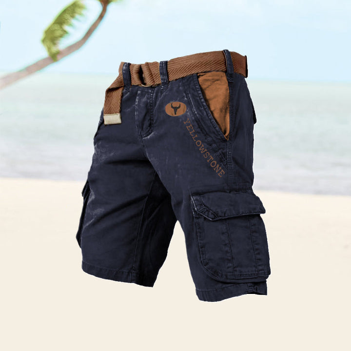 Graue Cargo-Shorts für Herren, seitliche Ansicht, langlebiges Baumwollmaterial, sechs Taschen, ideal für Sommeraktivitäten.