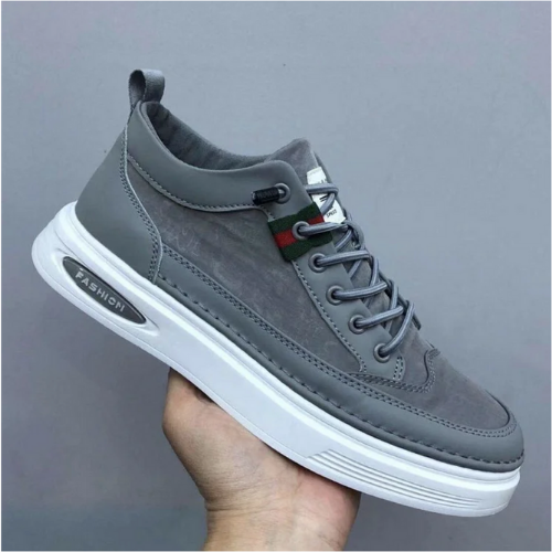 "Graue orthopädische Herrenschuhe, seitliche Ansicht, stilvoll und komfortabel, perfekt für Alltag und formelle Anlässe."