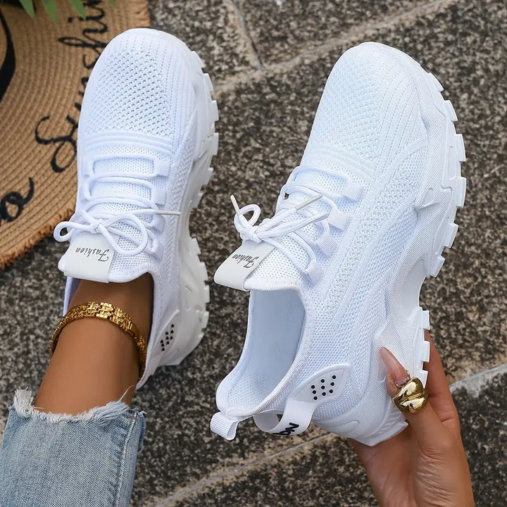 "Graue ortopädische Sneakers für Damen mit stoßdämpfenden Gel-Innensohlen und rutschfesten Sohlen, elegant und komfortabel."
