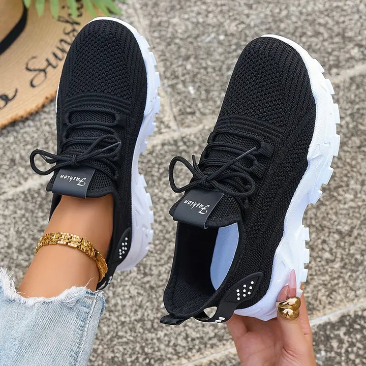 "Graue ortopädische Sneakers für Damen mit stoßdämpfenden Gel-Innensohlen und rutschfesten Sohlen, elegant und komfortabel."