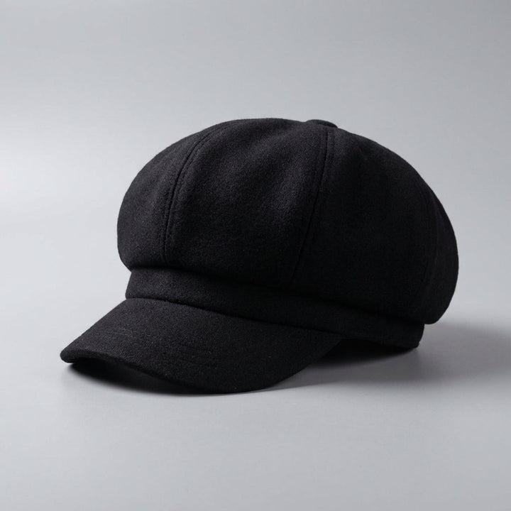 Klassische schwarze Ballonmütze, Einheitsgröße, aus Baumwolle, ideal als Winter Modeaccessoire.