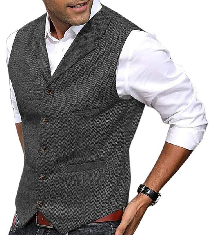 Mann in grauer Tweed-Weste und weißem Hemd, elegante Herrenmode, Business-Look.