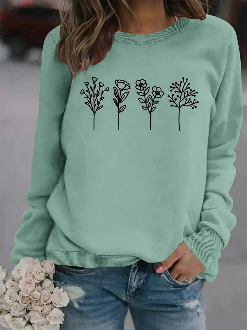 Hellgrünes Damen Sweatshirt mit floralem Herbstmuster. Gemütlich, langarm & rundhals. Stilvolle Herbst-Freizeitmode.