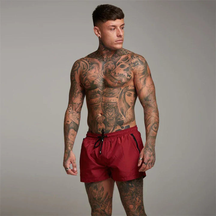 Herren Badeshorts schnelltrocknend mit Reißverschlusstaschen. Perfekt für Sommer, Strand & Wassersport.