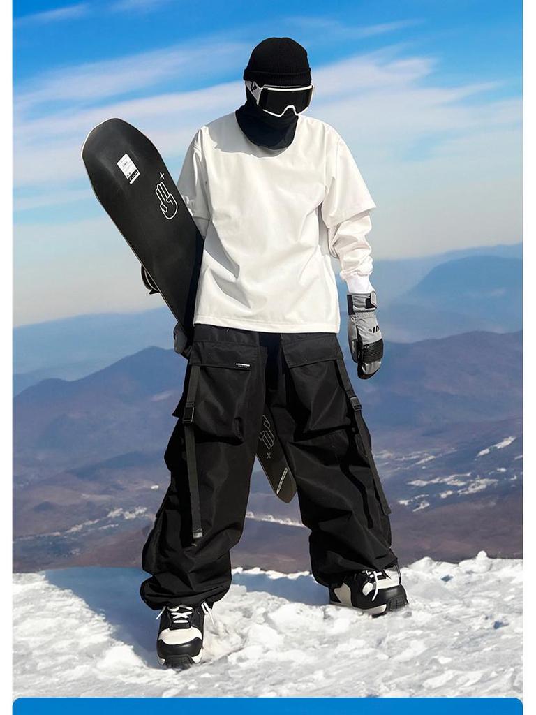 Herren Baggy Skihose mit praktischen Cargotaschen, ideal für Freeride und Pisten.